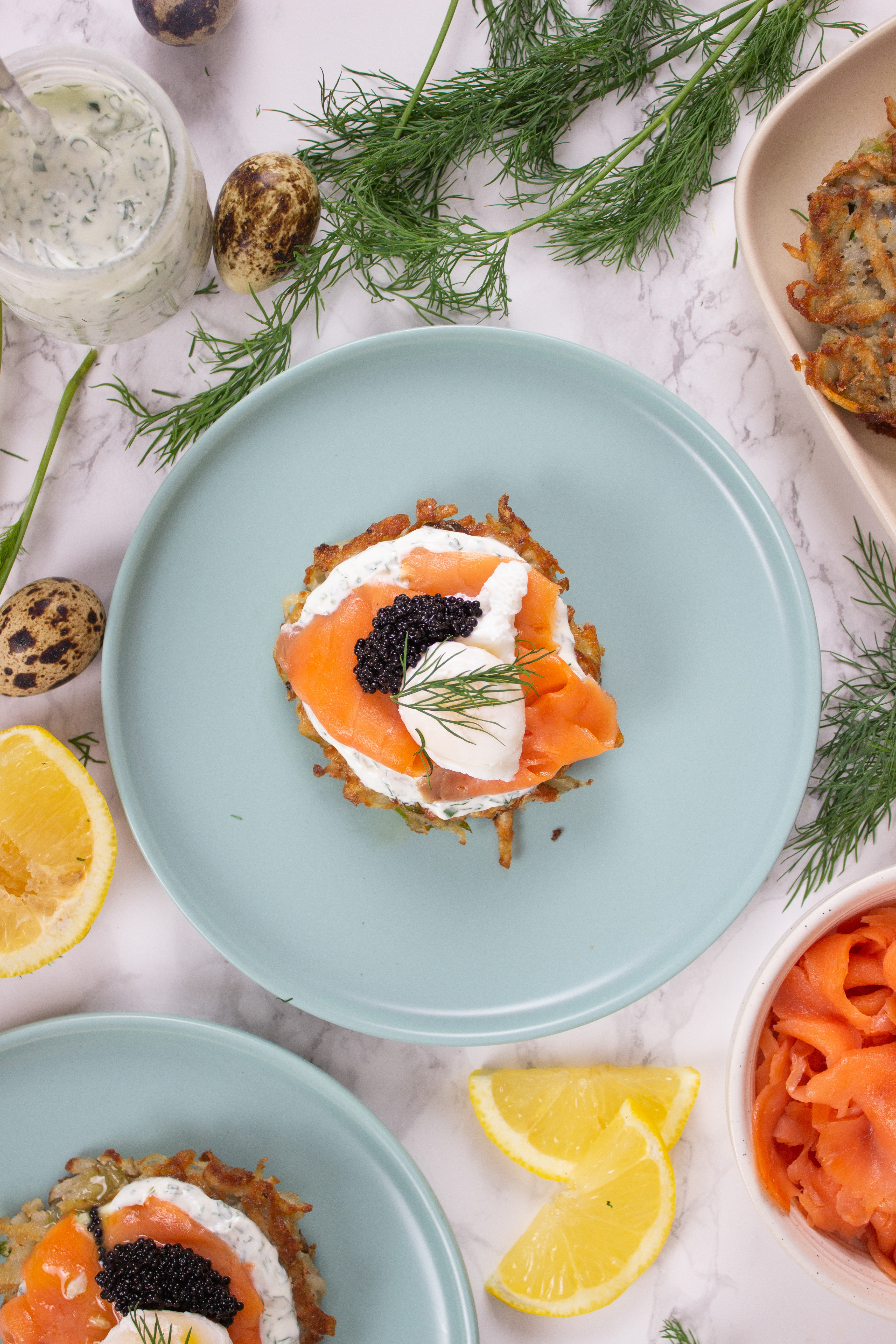 Potato Latkes with Poached Quail Eggs, Lemon Dill Crème Fraîche and Caviar