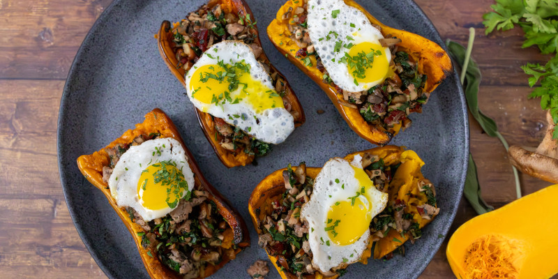 Cranberry and Sausage Stuffed Honeynut Squash with Quail Eggs