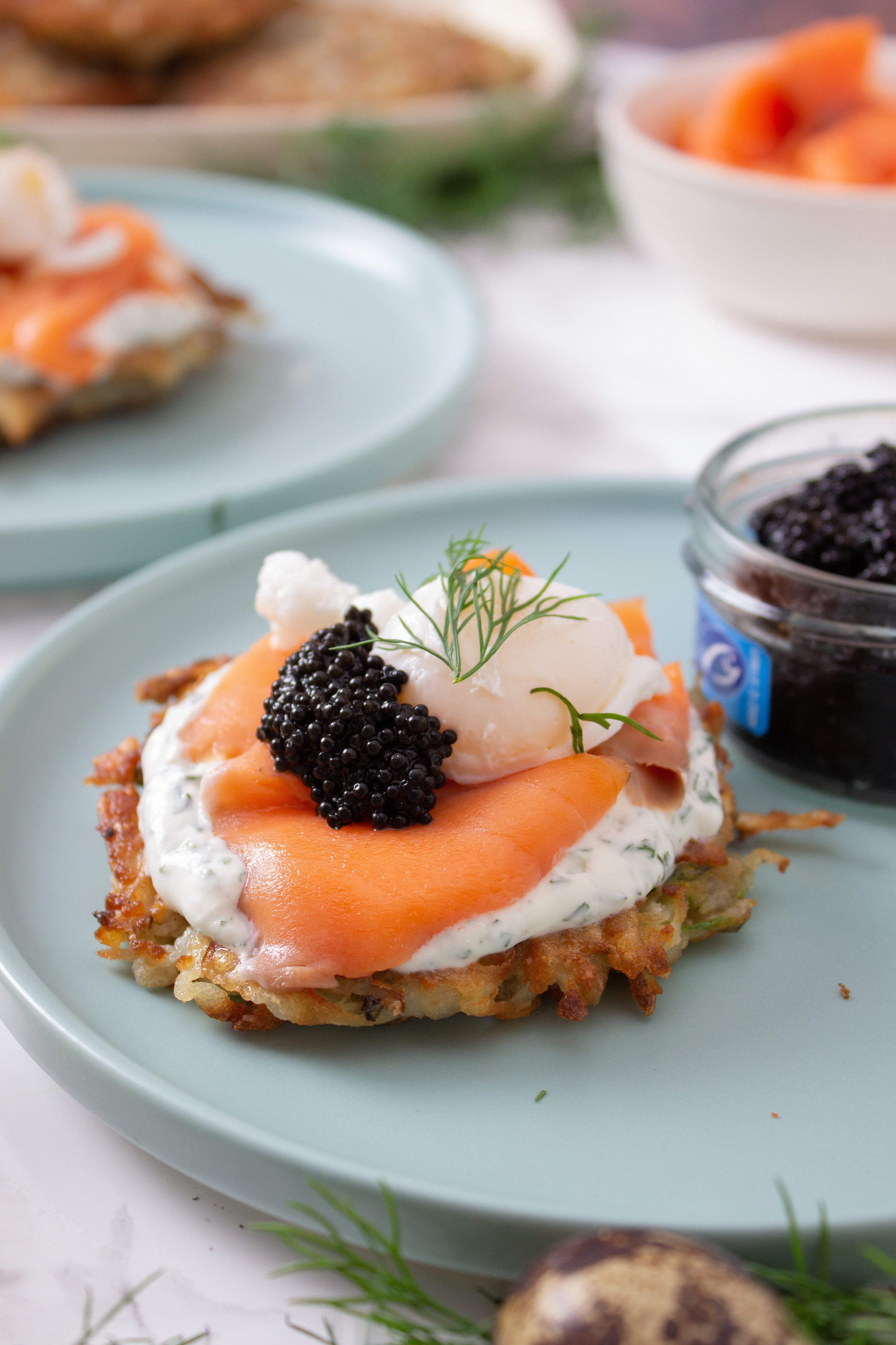 Potato Latkes with Poached Quail Eggs, Lemon Dill Crème Fraîche and Caviar